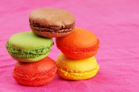 Pile of macaroons on pink Stock Photos