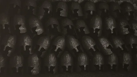 A Pile of Medieval Helmets Stock Footage 107117327