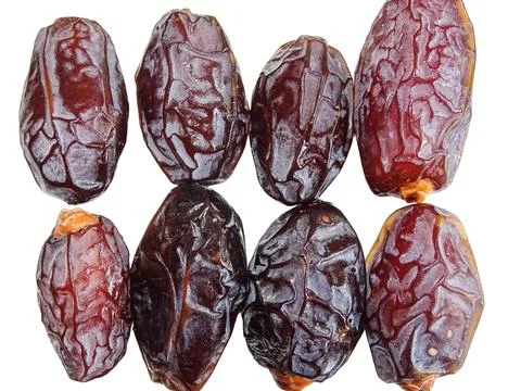 Pile of Medjool dates isolated on white 写真素材