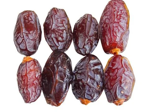 Pile of Medjool dates isolated on white Фото
