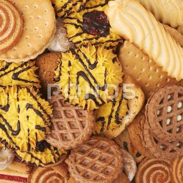 Pile of mix cookies isolated over the white background Stock Photos