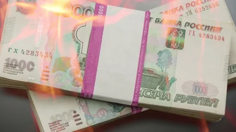 Pile of money in wrapper on fire 库存影片 224895482