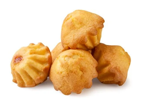 Pile of muffins close-up on a white background. Isolated Stock Photos