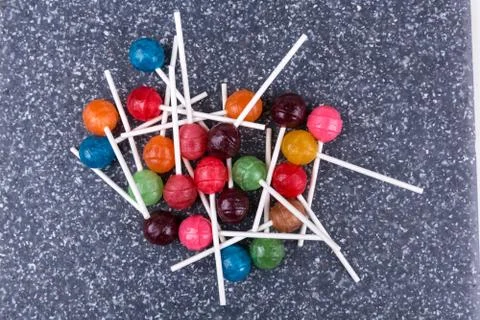 Pile of multicolored candy suckers Stock-Fotos