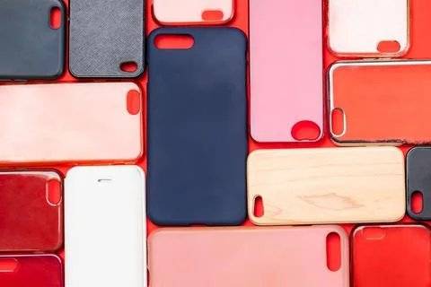 Pile of multicolored plastic back covers for mobile phone. Choice of smart phone Stock Photos