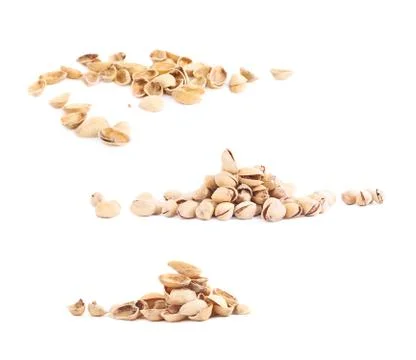 Pile of multiple pistachios isolated Stock Photos