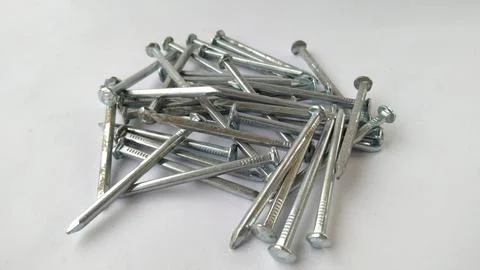 Pile of nails on a white background 库存照片