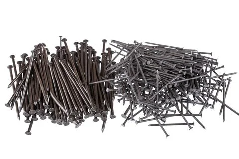 Pile of nails on a white background Stock Photos