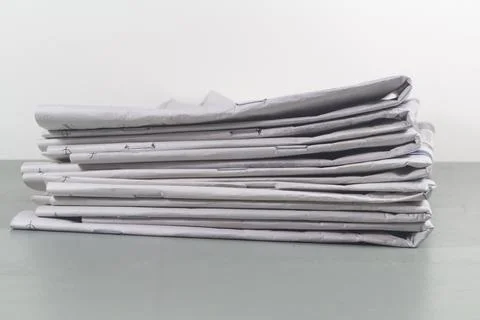 Pile of newspapers Stock Photos