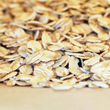 Pile of oat flakes Stock Photos