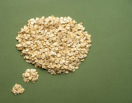 Pile of oatmeal in thinking bubble shape 스톡 사진