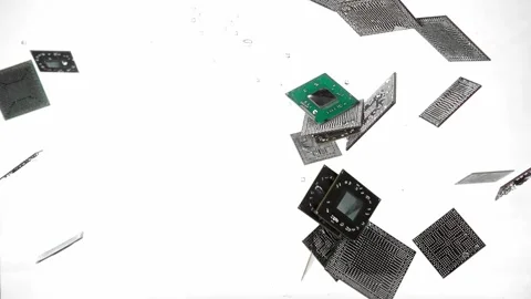 Pile of old cpu chips are thrown into clear transparent water filmed in macro Stock Footage 292644250