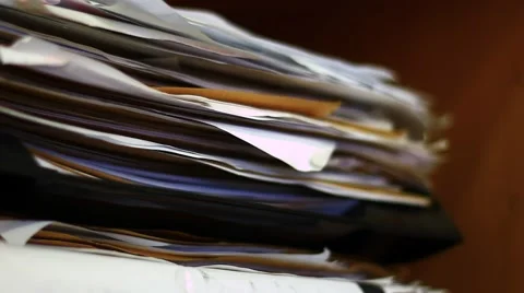 Pile of old documents under shallow DOF Stock Footage 43689675
