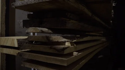 Pile of old drying lumber pine self employed carpenter woodwork wood workshop 스톡 동영상 100412471