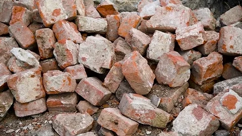 Pile of old red bricks on a demolition site Stock Footage 273197615