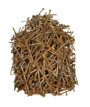 Pile of old rusty nails of various sizes isolated on white background. Foto stock
