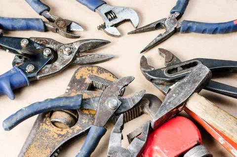 Pile of old tools for construction and repair of plumbing . Stock Photos