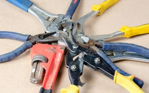 Pile of old tools used in the construction industry . Stock Photos