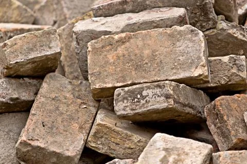 Pile of Old Used Bricks as Construction Material 写真素材