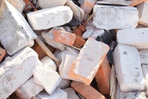Pile of old used bricks. construction of houses. background 写真素材