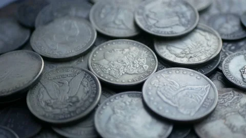Pile Of One Dollar Coins. Loop 4K Stock Footage 101419560