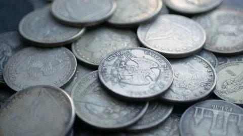 Pile Of One Dollar Coins. Loop 4K Stock Footage 101419568