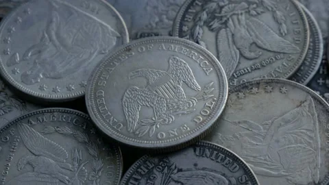 Pile Of One Dollar Coins. Loop 4K Stock Footage 101419787