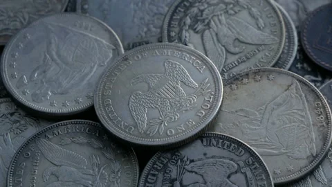 Pile Of One Dollar Coins. Loop Stock Footage 101419836