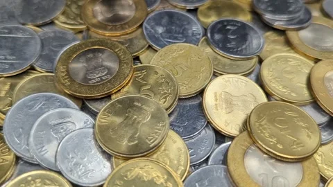 A pile of one, two, five and ten rupee coins of india Stock Footage 252168333