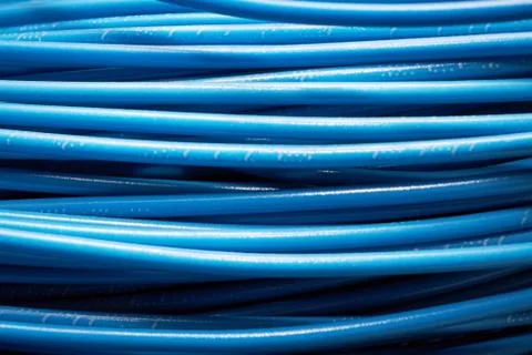 A pile or stack of blue electrical wires. Foto stock