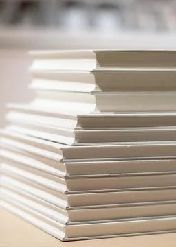 Pile or stack of books in bookstore. Vertical format photo. Foto stock