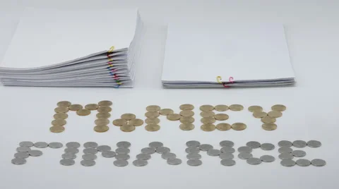 Pile overload paperwork with gold and silver coins time lapse Stock Footage 67971091