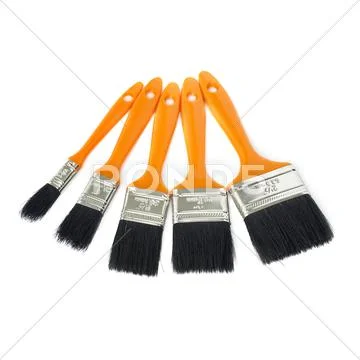 Pile of Paint brushes over isolated white background Stock Photos