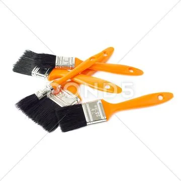 Pile of Paint brushes over isolated white background Stock Photos