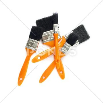Pile of Paint brushes over isolated white background Stock Photos