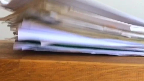 Pile of paper dropping down slow motion Stock Footage 109594630