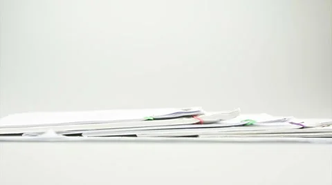 Pile paperwork overload as mountain on table time lapse Stock Footage 44698721