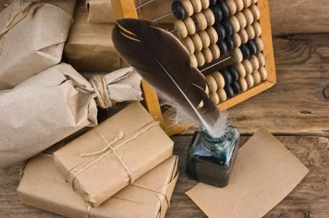 Pile parcel and abacus Stock Photos