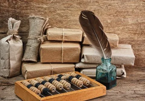 Pile parcel and abacus Stock Photos