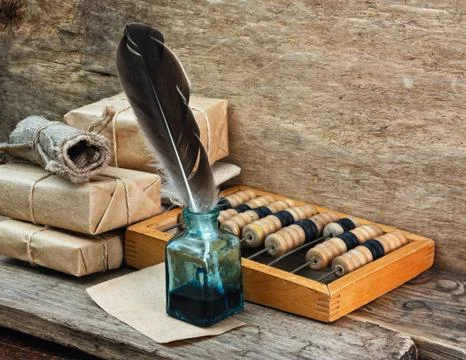 Pile parcel and abacus Stock Photos
