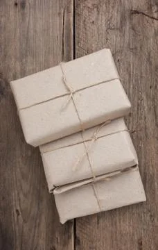 Pile parcel wrapped Stock Photos