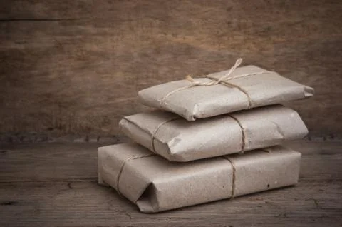 Pile parcel wrapped Stock Photos
