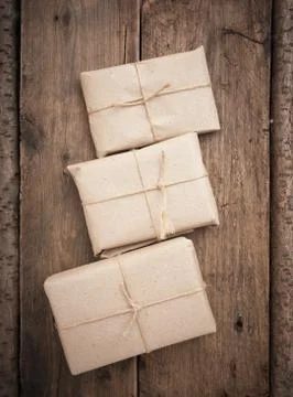 Pile parcel wrapped Stock Photos