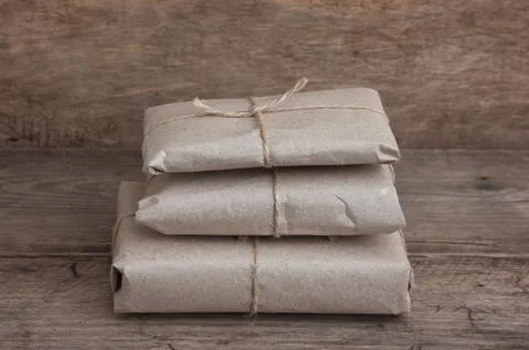 Pile parcel wrapped Stock Photos