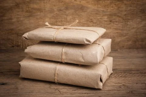 Pile parcel wrapped Stock Photos
