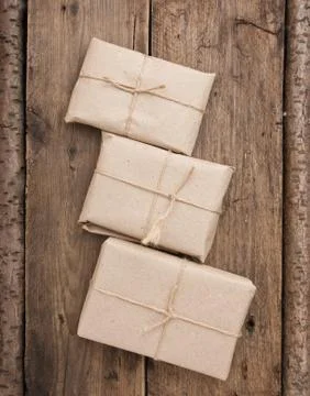 Pile parcel wrapped Stock Photos