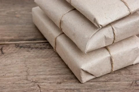 Pile parcel wrapped Stock Photos