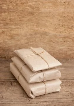Pile parcel wrapped Stock Photos