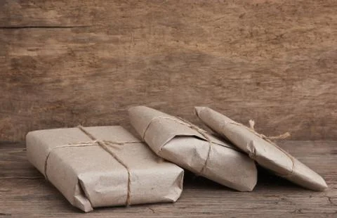 Pile parcel wrapped Stock Photos
