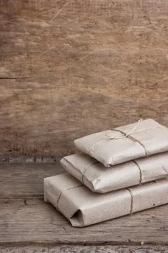 Pile parcel wrapped Stock Photos